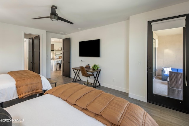 10299 E White Feather Ln, Scottsdale, AZ 85262 - bedroom featuring wood finished floors and ceiling fan