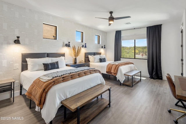 10299 E White Feather Ln, Scottsdale, AZ 85262 - bedroom featuring wood finished floors and a ceiling fan