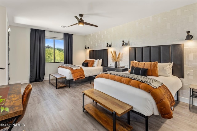 10299 E White Feather Ln, Scottsdale, AZ 85262 - bedroom featuring wood finished floors and a ceiling fan