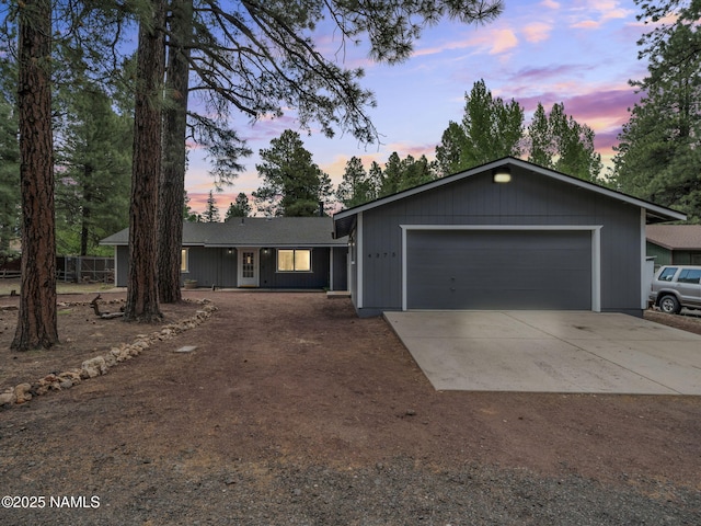 4375 Canyon Loop, Flagstaff, AZ 86005 - ranch-style home featuring an attached garage and driveway