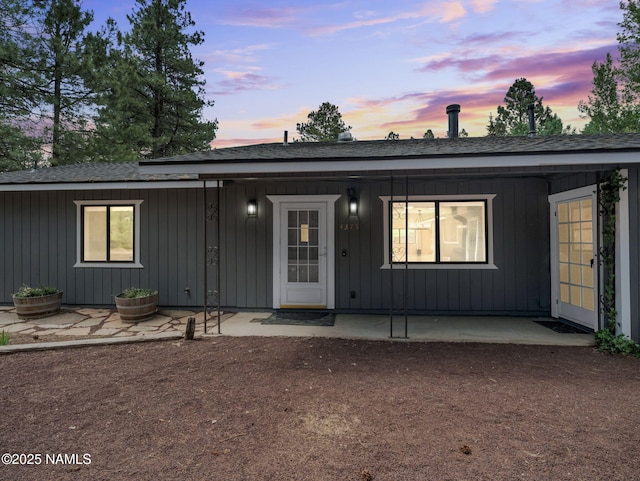 4375 Canyon Loop, Flagstaff, AZ 86005 - ranch-style home with a shingled roof and covered porch