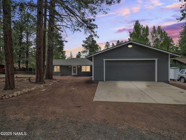 4375 Canyon Loop, Flagstaff, AZ 86005 - ranch-style house with concrete driveway and an attached garage