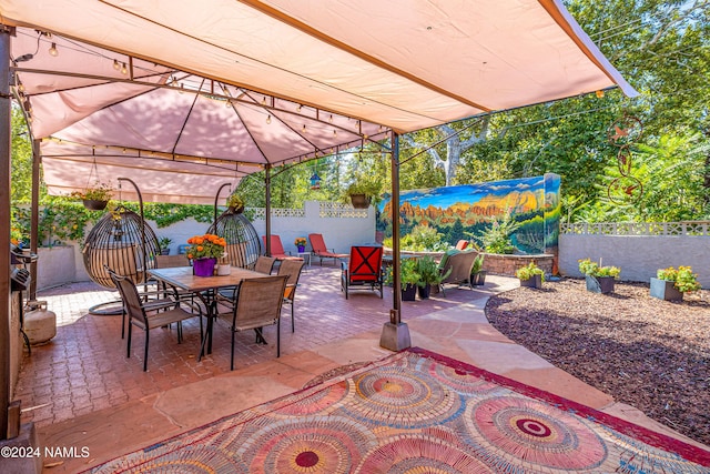 view of patio featuring a gazebo