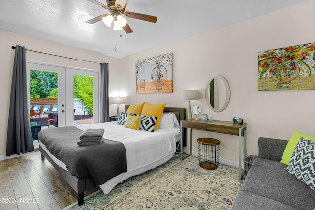 bedroom with ceiling fan, french doors, access to exterior, and wood-type flooring