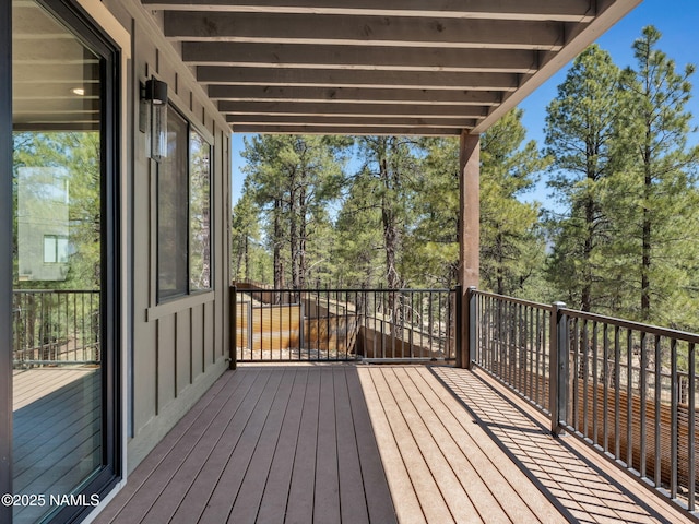 2566 S Cottonrose Ln, Flagstaff, AZ 86005 - wooden terrace featuring view of scattered trees