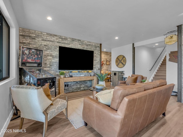 2566 S Cottonrose Ln, Flagstaff, AZ 86005 - living area featuring wood finished floors, stairs, and recessed lighting