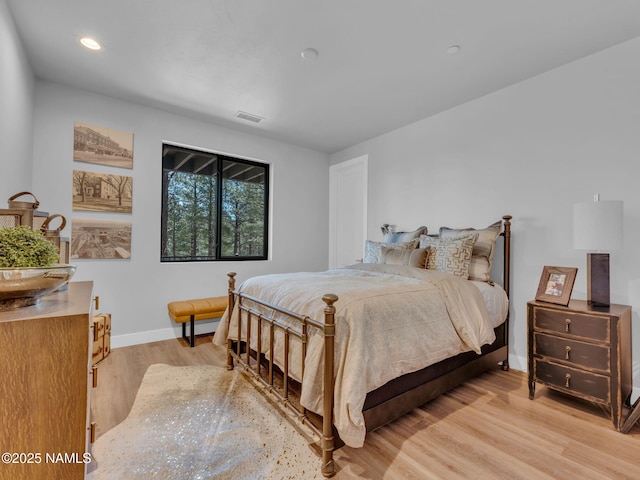 2566 S Cottonrose Ln, Flagstaff, AZ 86005 - bedroom featuring baseboards, light wood-type flooring, and recessed lighting