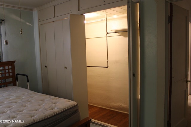 620 W Elm St, Winslow, AZ 86047 - bedroom with wood finished floors and a closet