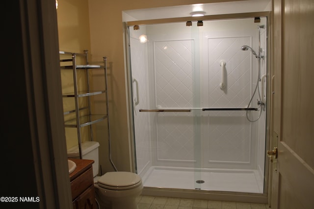 620 W Elm St, Winslow, AZ 86047 - bathroom with vanity, a stall shower, and tile patterned flooring