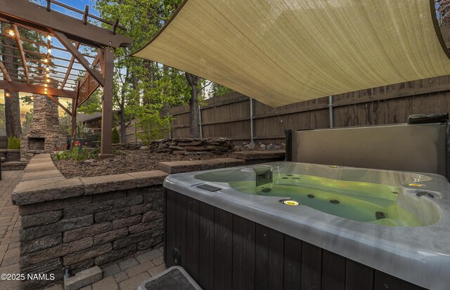 1085 N Conifer Rd, Flagstaff, AZ 86001 - view of patio / terrace with a hot tub