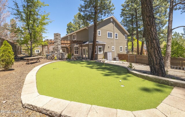 1085 N Conifer Rd, Flagstaff, AZ 86001 - back of property with a putting area