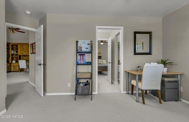 1085 N Conifer Rd, Flagstaff, AZ 86001 - home office with a ceiling fan, carpet floors, and baseboards