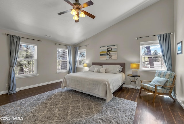 1085 N Conifer Rd, Flagstaff, AZ 86001 - bedroom featuring wood finished floors, baseboards, multiple windows, and high vaulted ceiling