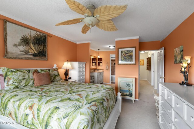 bathroom featuring hardwood / wood-style flooring, a textured ceiling, vanity, and crown molding