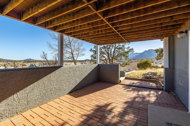 5495 E Crisp Hill Rd, Flagstaff, AZ 86004 - wooden terrace with a patio and a mountain view