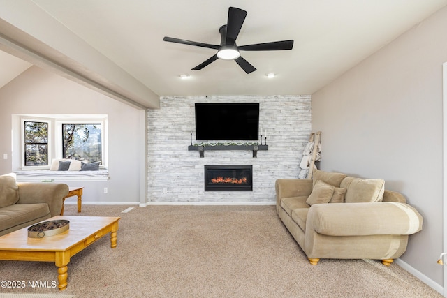 5495 E Crisp Hill Rd, Flagstaff, AZ 86004 - living room featuring carpet floors, a fireplace, baseboards, ceiling fan, and vaulted ceiling