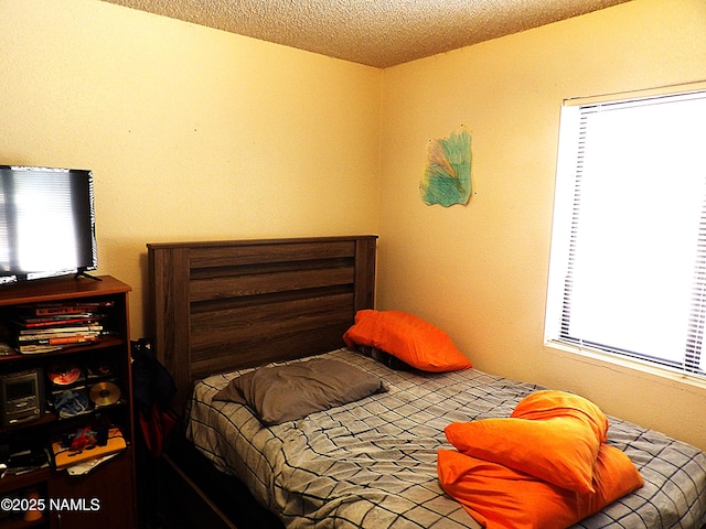 bedroom with a textured ceiling