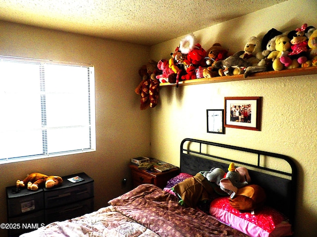 bedroom with a textured ceiling