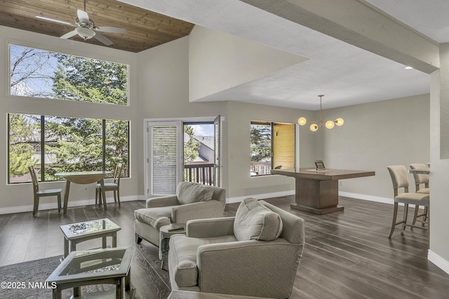 2800 N Saddleback Way Unit 2, Flagstaff, AZ 86004 - living area featuring ceiling fan with notable chandelier, baseboards, a high ceiling, and dark wood finished floors