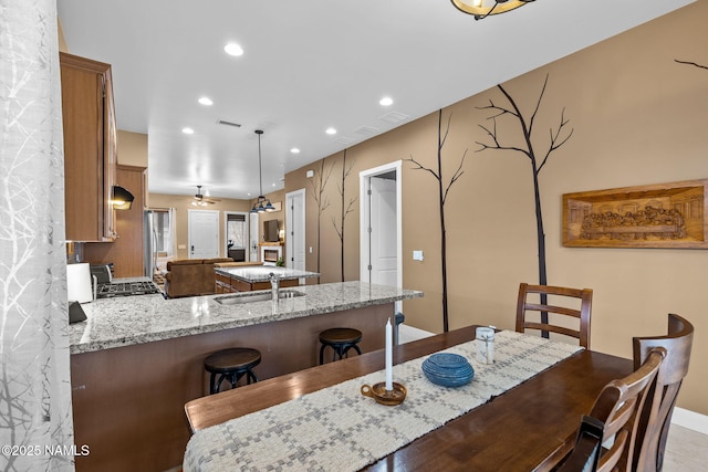 dining space with recessed lighting and visible vents