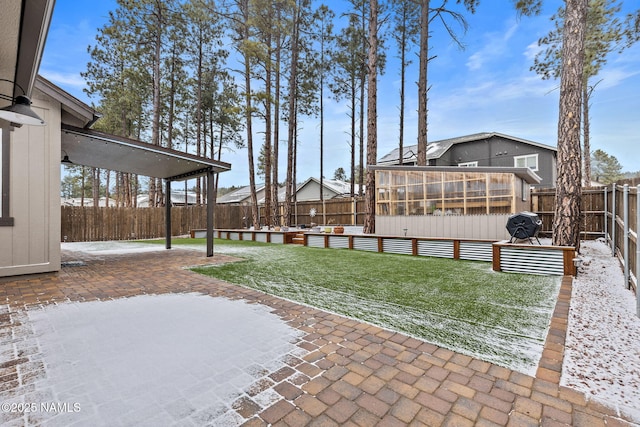 view of yard with a patio area and a fenced backyard