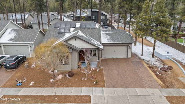 birds eye view of property with a residential view