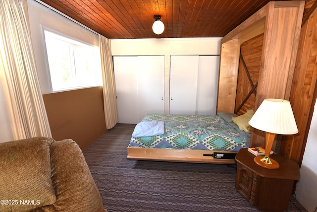 733 S 3rd St, Williams, AZ 86046 - bedroom with multiple closets, carpet floors, and wood ceiling