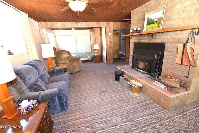 733 S 3rd St, Williams, AZ 86046 - living room with carpet floors, a ceiling fan, wooden ceiling, and wood walls