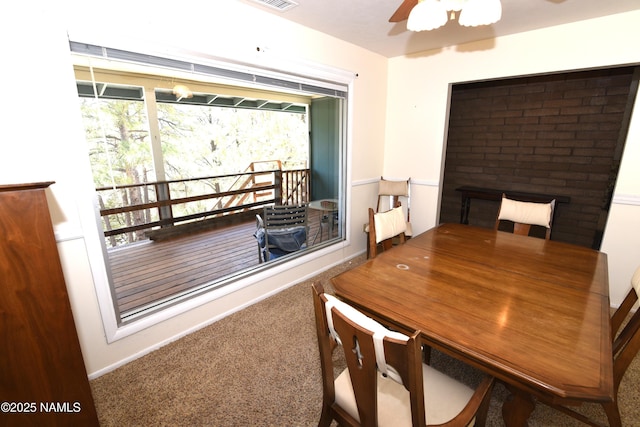 733 S 3rd St, Williams, AZ 86046 - dining space with carpet flooring, a ceiling fan, healthy amount of natural light, and baseboards