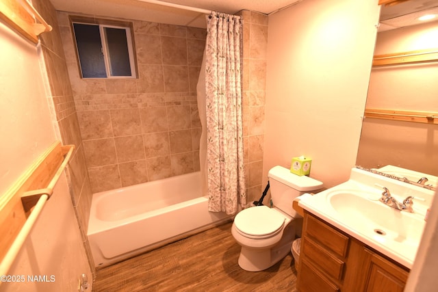 733 S 3rd St, Williams, AZ 86046 - full bathroom with toilet, vanity, wood finished floors, and shower / bath combo