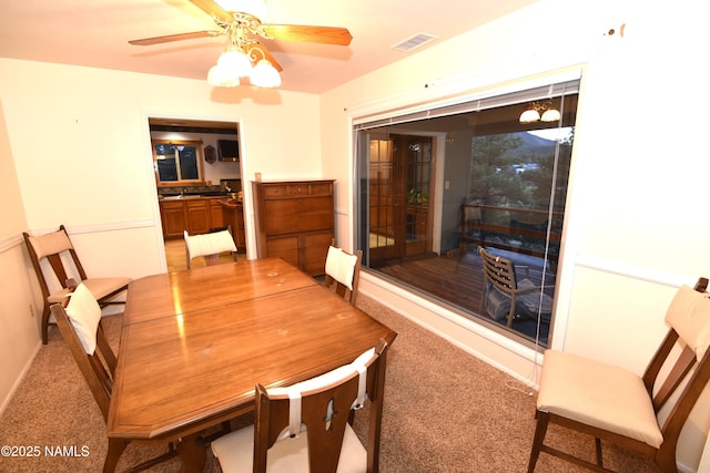733 S 3rd St, Williams, AZ 86046 - dining space with carpet flooring, ceiling fan, and baseboards