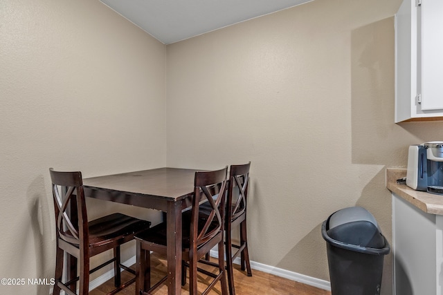 1385 W University Ave Unit 194, Flagstaff, AZ 86001 - dining area with baseboards and light wood-style floors