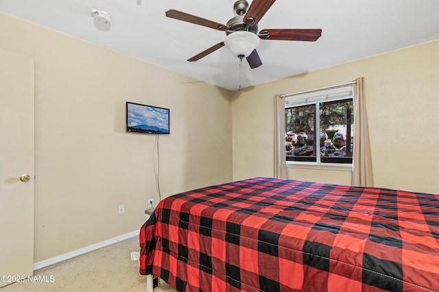1385 W University Ave Unit 194, Flagstaff, AZ 86001 - carpeted bedroom featuring baseboards and ceiling fan