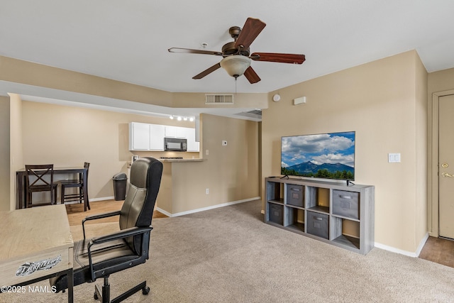 1385 W University Ave Unit 194, Flagstaff, AZ 86001 - home office with ceiling fan and light carpet