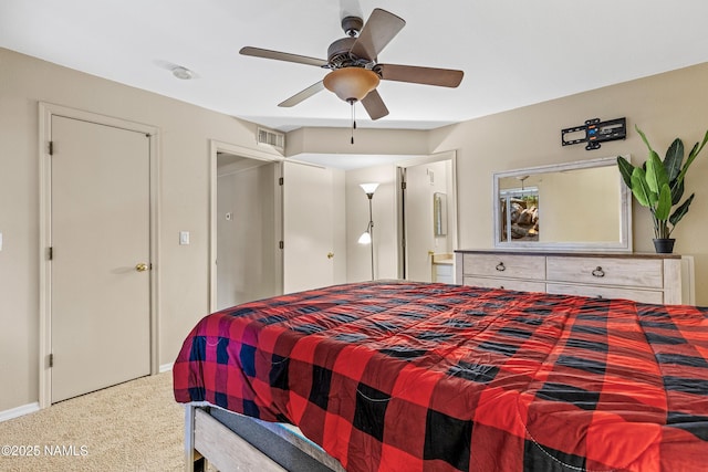1385 W University Ave Unit 194, Flagstaff, AZ 86001 - carpeted bedroom featuring ensuite bathroom and ceiling fan