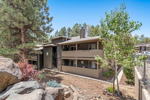 1385 W University Ave Unit 194, Flagstaff, AZ 86001 - back of property with a chimney
