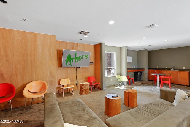 1385 W University Ave Unit 194, Flagstaff, AZ 86001 - carpeted living area with recessed lighting and a community bar