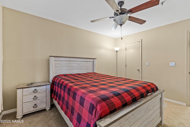 1385 W University Ave Unit 194, Flagstaff, AZ 86001 - carpeted bedroom featuring baseboards and ceiling fan