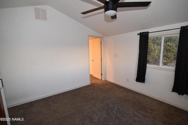 1026 E San Marcos Rd, Williams, AZ 86046 - empty room featuring lofted ceiling, carpet, a ceiling fan, and baseboards