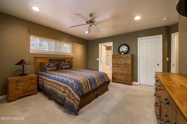 2587 S Cliffview St, Flagstaff, AZ 86001 - bedroom featuring light colored carpet, baseboards, recessed lighting, connected bathroom, and ceiling fan