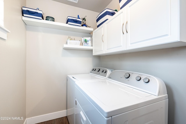 2749 Adirondack Ave, Flagstaff, AZ 86001 - clothes washing area featuring dark wood-type flooring, cabinets, and washing machine and clothes dryer