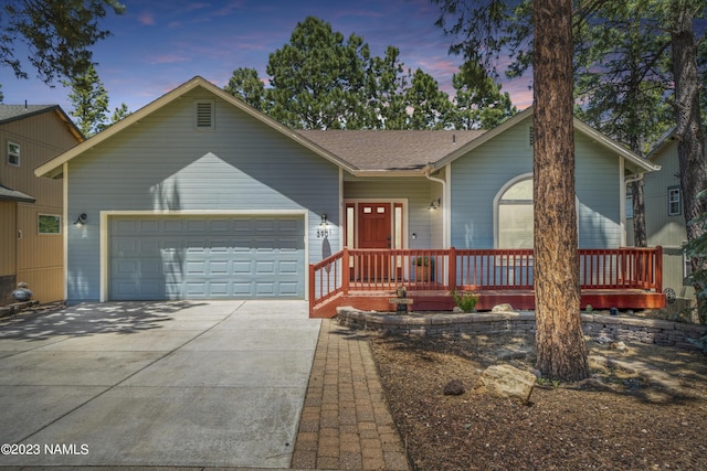 view of front of property with a garage