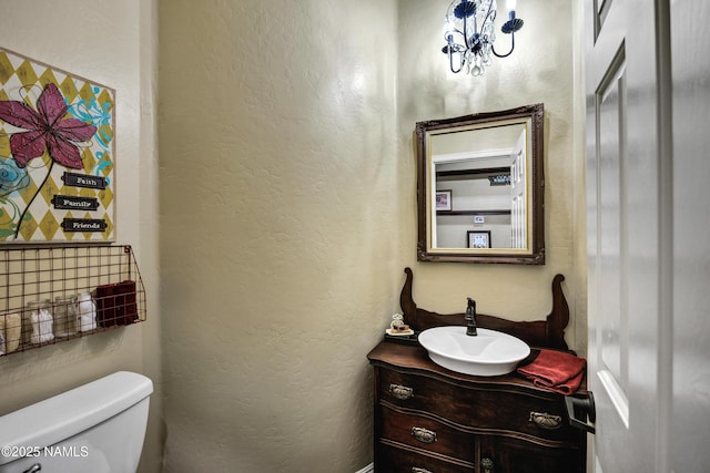 41215 N Lytham Ct, Phoenix, AZ 85086 - half bathroom with vanity and toilet