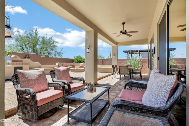 41215 N Lytham Ct, Phoenix, AZ 85086 - view of patio / terrace with outdoor dining space, a ceiling fan, outdoor lounge area, and exterior kitchen