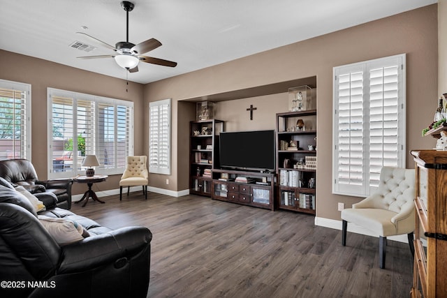41215 N Lytham Ct, Phoenix, AZ 85086 - living room with wood finished floors, a ceiling fan, and baseboards