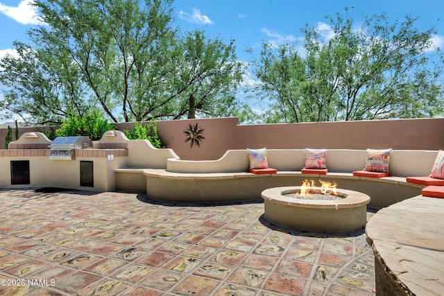 41215 N Lytham Ct, Phoenix, AZ 85086 - view of patio / terrace with a fire pit
