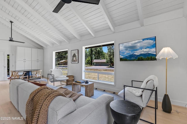 535 Stringer Rd, Munds Park, AZ 86017 - living room with ceiling fan, wood finished floors, plenty of natural light, a wooden ceiling with exposed beams, and high vaulted ceiling
