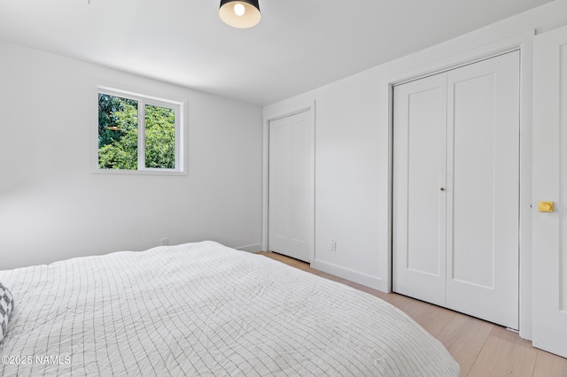 535 Stringer Rd, Munds Park, AZ 86017 - bedroom featuring light wood finished floors and baseboards