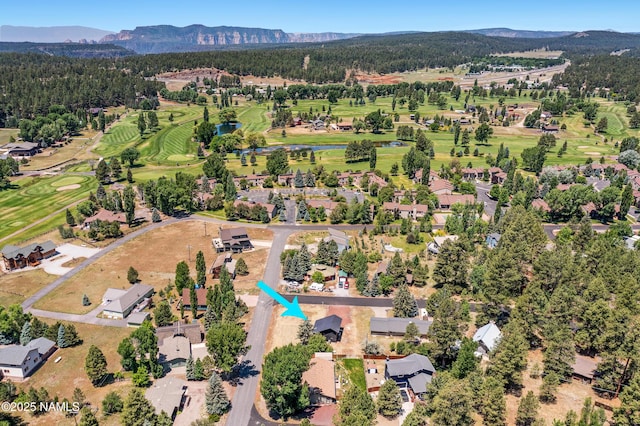 535 Stringer Rd, Munds Park, AZ 86017 - aerial view of property and surrounding area featuring a water and mountain view and a golf club