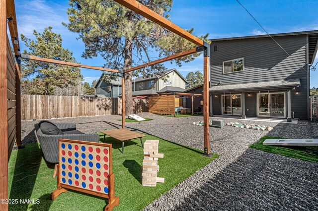 3580 Huron, Flagstaff, AZ 86005 - view of yard featuring a fenced backyard and a patio area